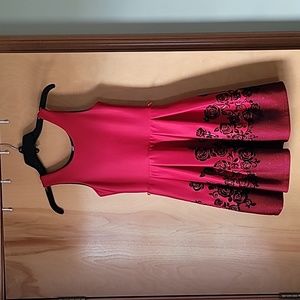 Red dress with black floral print